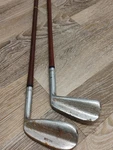 Antique Wilson Hickory Shaft Irons 5 + 7 Leather Grips. Fixed Price $47.99.